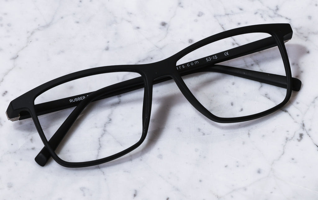 Square reading glasses from Luxreaders on a table