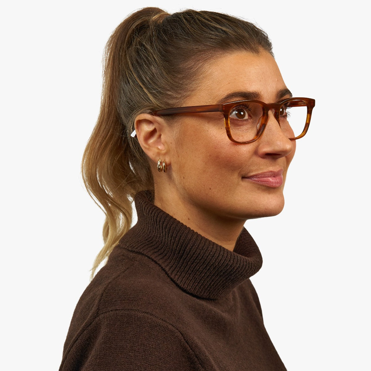 womens-bornholm-shiny-walnut_reading-glasses_female-model-1.jpg?v=1771420598&width=1200