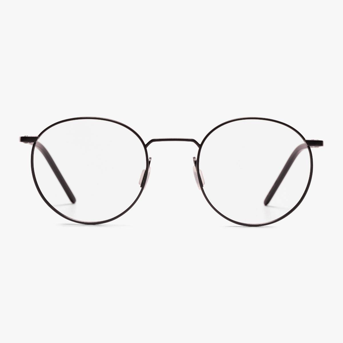 Black round reading glasses on white background