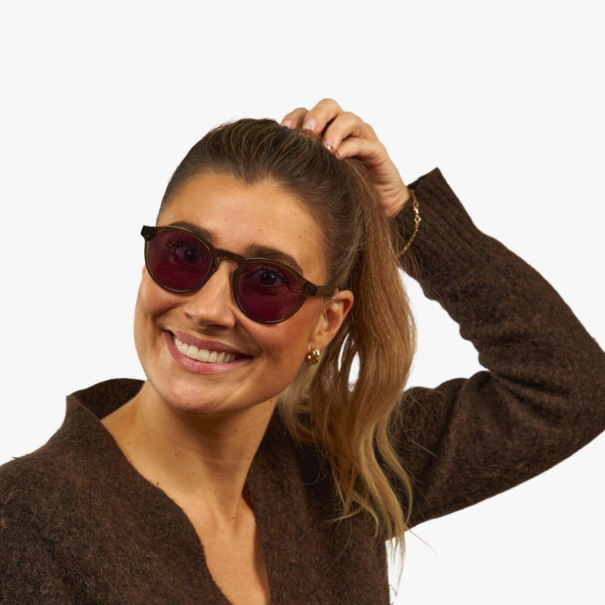 Person wearing Trondheim shiny olive sunglasses
